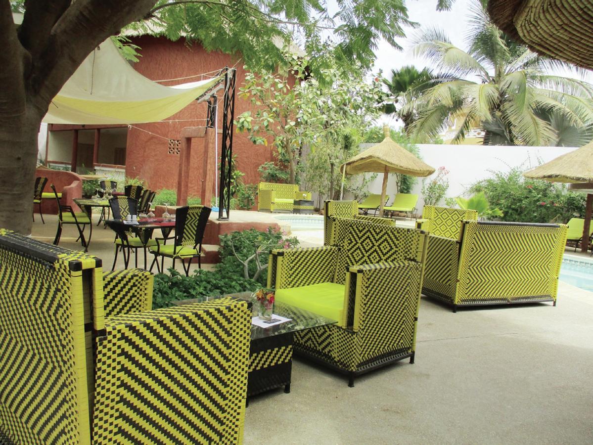 Hotel Le Lion Dort Somone Exterior foto